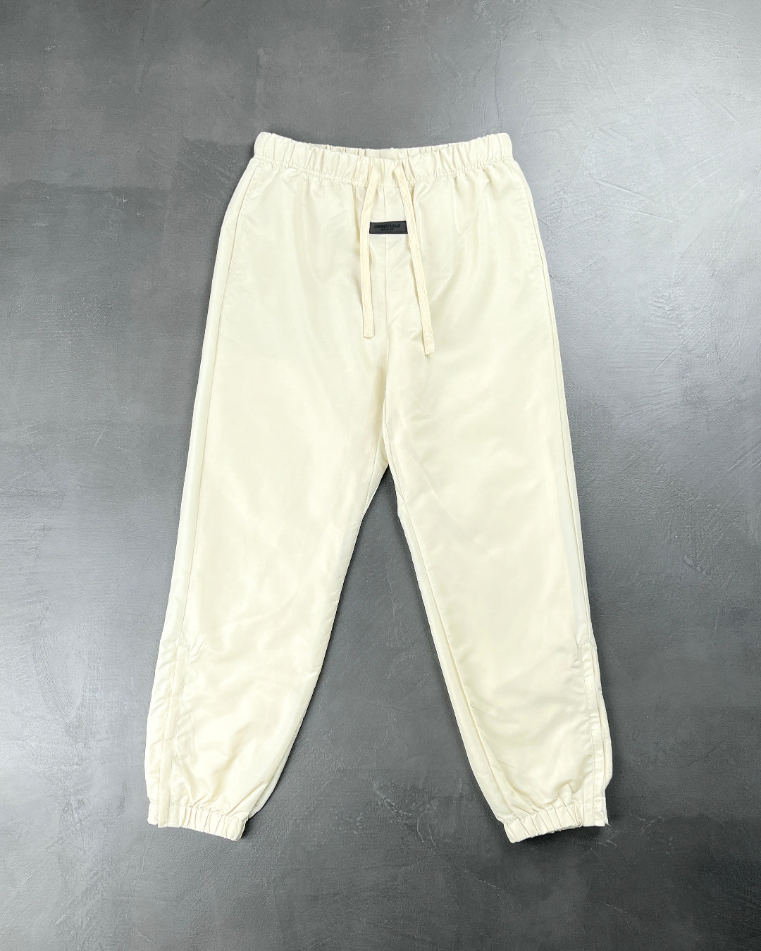 Fear Of God Essentials Nylon Track Pants With Logo Cream