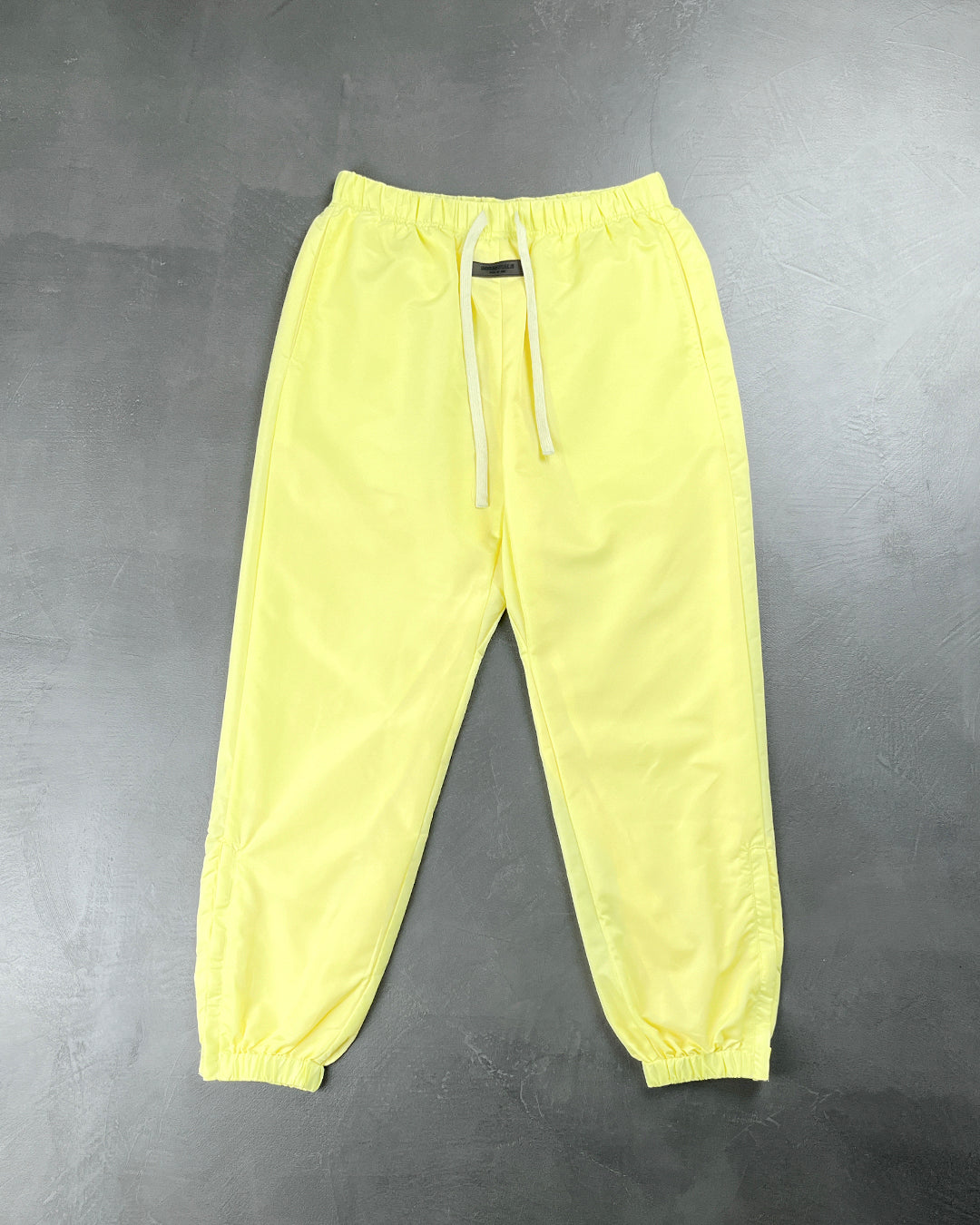 Fear Of God Essentials Nylon Track Pants With Logo Yellow