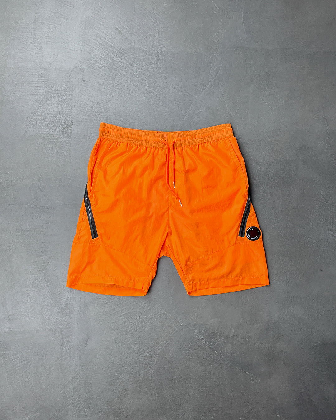 C.P. COMPANY Chrome Lens Pocket Shorts Orange